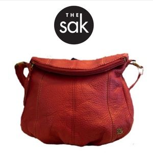 The Sak Cherry Deena Flap Shoulder Bag — Red Pebbled Leather.